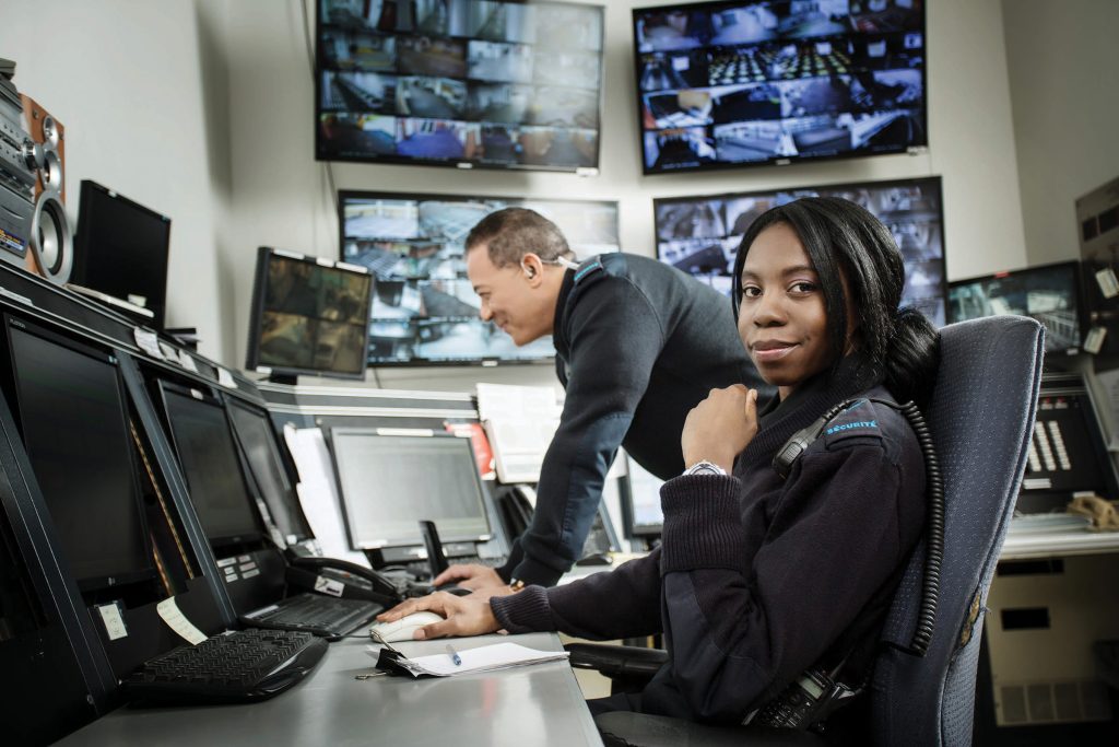 Security agents in central command centre at the Québec City Convention Centre.