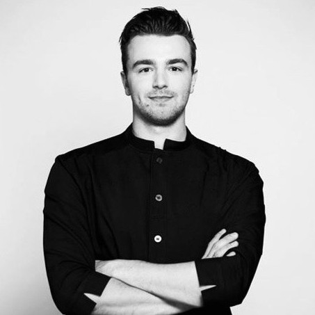 Black-and-white portrait of Cédric St-Pierre, executive chef at Maestro Culinaire since November 2025.