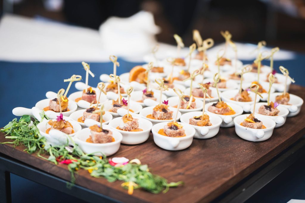 Amuse bouche on wood cutting board.