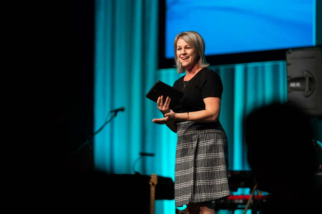 Ms. Karina Lehoux, a professional conference host, hosting the gala for the Soirée Hommage aux ambassadeurs.