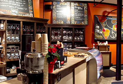 Coffee shop with orange walls.