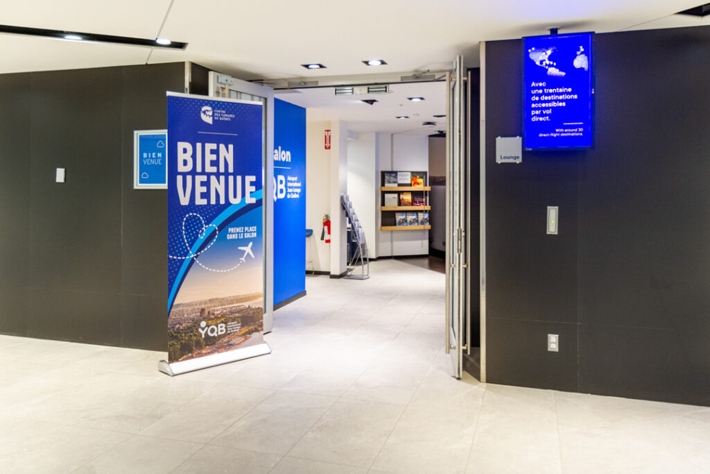 Entrance to Salon YQB at the Québec City Convention Centre, with welcome signage and lounge branding.